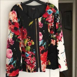 Floral jacket with zip front detail. Worn once.